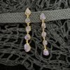 amethyst golden stud dangler purple by silly owl