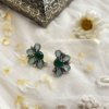 half flower floral oxidised stud earring with green stone by silly owl