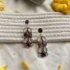 minimalistic drop hanging dangle oxidised silver look alike earrings with maroon red and beige nude color stones by silly owl