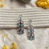 minimalistic drop hanging dangle oxidised silver look alike earrings with mint blue and baby pink color stones by silly owl