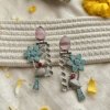 nature jungle theme oxidised matt finish silver look alike earrings with bords and flowers with pink and blue stones by silly owl