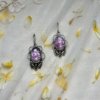 oxidised earring floral jewellery hand painted on pink stone by silly owl