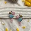 udaan topper stud bird 3 color stone oxidised silver look alike earrings with blue, pink and yellow stone by silly owl