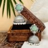 Alankara oxidised Jhumka earrings with a green monalisa stone and Moti hanging by silly owl