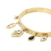 Gold cuff Kada bracelet with evil eye hanging charms by silly owl