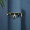 Gold cuff Kada bracelet with evil eye hanging charms by silly owl