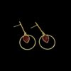 Minimalistic line circle earring with a gold finish and geometric pattern and a maroon drop shaped stone by silly owl(2)