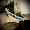 blue enamel pop colours cuff kada with multi colour stones and gold finish