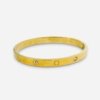 cartier look alike glossy gold finish cuff kada bracelet band with alternate diamond stone by silly owl