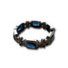 elegant rectangular and flower oxidised kada by silly owl with a screw closure and blue, red and green stones