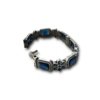 elegant rectangular and flower oxidised kada by silly owl with a screw closure and blue stones