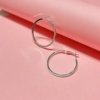 flat pipe shaped medium size 4 cms silver finish hoop western earrings for an everyday look by silly owl