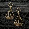 geometrical golden long earrings brown stone by silly owl