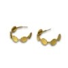 gold coin pressed quirky light weight hoops made of brass with a brushed gold finish by silly owl