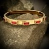 ruby red rectangular stone on gold electroplated cuff kada bracelet band by silly owl