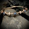 trending evil eye alternated with diamond ring cuff kada bracelet with a magnetic closure and a rose gold finish by silly owl