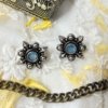 tribal look oxidised stud earrings with a blue monalisa stone by silly owl