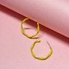 yellow pvc coated minimalistic hoops by silly owl