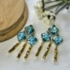 14k gold plated premium dangler earrings with turquoise blue zirconia natural stones by silly owl gold jewellery