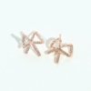 AD artificial diamond studded bow shaped western collection dainty earrings with a rose gold finish anti tranish water resitant jewllery with a silver 925 post elegance by silly owl