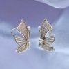 AD artificial diamond studded butterfly design with white enamel western collection dainty earrings with a gold finish anti tranish water resitant jewllery with a silver 925 post elegance by silly owl