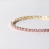 gold finish with ad artificial diamond having round pink diamonds elegant tennis bracelet anti tarnish water resistant jewelry by silly owl