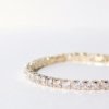 gold finish with ad artificial diamond having square shaped diamonds elegant tennis bracelet anti tarnish water resistant jewelry by silly owl