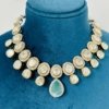 art bridal wedding jewellery with cubic zirconia cz , blue zirconia with mossanite polki and a silver polish necklace set with earrings by silly owl