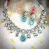 art bridal wedding jewellery with cubic zirconia cz blue zirconia with mossanite polki and a silver polish necklace set with earrings by silly owl