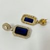 art jewellery with cubic zirconia cz and royal blue monalisa stones with mossanite polki with a silver polish and gold vintage look necklace set with earrings by silly owl