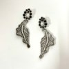 contemporary design oxidised earrings by silly owl with a floral top black stones and pearl and a hanging leaf design (2)