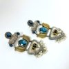 dual tone silver gold polish oxidised earrings with blue zirconia stone and lotus design with pearls statement jewellery by silly owl (1)