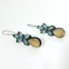 elegant oxidised dangler earring with a peach orange and teal blue monalisa stone floral design by silly owl oxidised jewelry 1