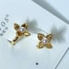 gold finish flower with pearl ear claw pair gold ear cuffs by silly owl 5