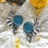 modern contemporary design anti allergy anti tarnish oxisided earrings with a 5 leaf design and a light blue monalisa stone by silly owl oxidised jewelery 1