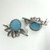 modern contemporary design anti allergy anti tarnish oxisided earrings with a 5 leaf design and a light blue monalisa stone by silly owl oxidised jewelry