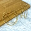 Geometric jumbo gold finish hoop earrings anti tarnish and hypoallergenic by silly owl (3)