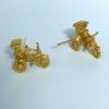 Vintage gold finish tricycle statement stud earrings by silly owl (1)