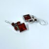 Elegant ruby red Monalisa stone hanging oxidised earrings with fish hook by silly owl (1)