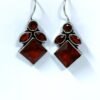 Elegant ruby red Monalisa stone hanging oxidised earrings with fish hook by silly owl (4)