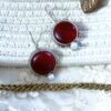 Light weight fish hook small dangler hanging earrings with a pearl and red monalisa stone by silly owl jewellery