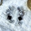 Light weight oxidised jhumka with black square monalisa stones with bird motifs and a pearl jhumki by silly owl jewellery